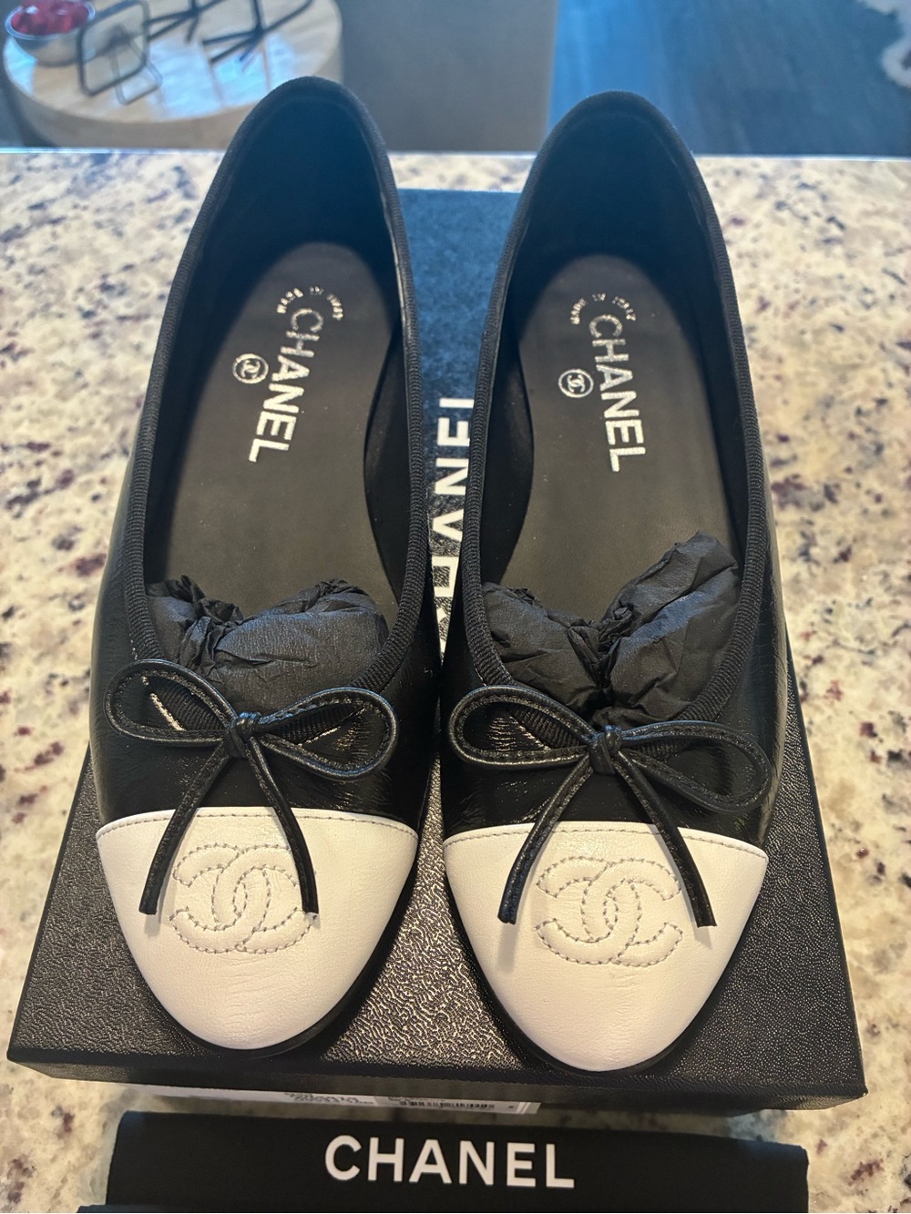 CHANEL Black Leather Ballet Flats with White Cap Toe and Bow - Picture 2 of 10